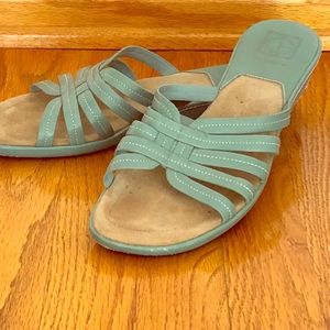 Slip on leather sandals.